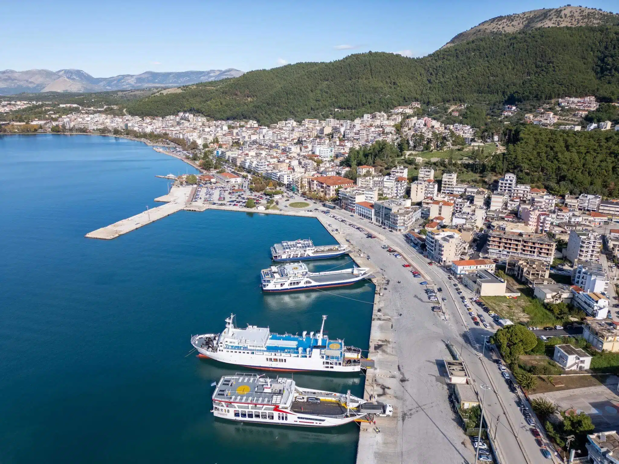 Aerial view of Igoumenitsa waterfront, with ferries docked beside the town