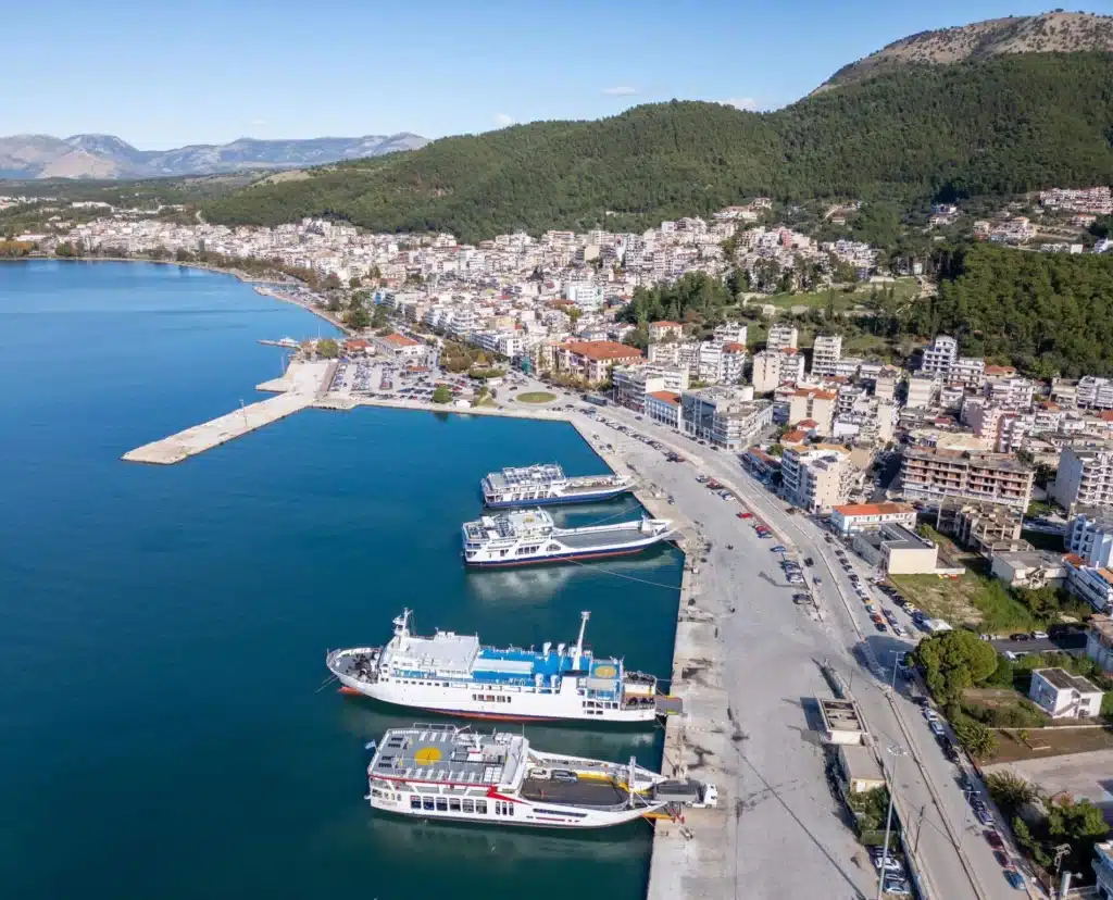 How to get to Thesprotia: Aerial view of Igoumenitsa port featuring ferry connections to Corfu and Italy - Travel Guide 2026.