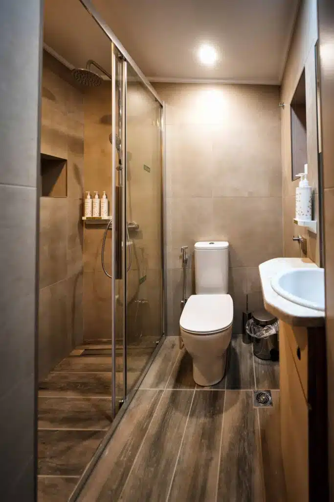 Modern bathroom with a glass shower and washbasin, Valaes Guesthouse, Foiniki