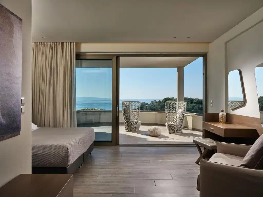 Sea-view suite at Prima Vista with the Ionian Sea beyond the balcony