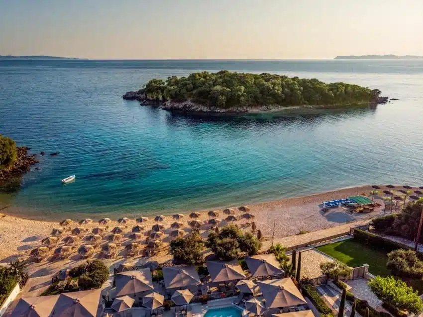 The wooded islet of Agia Paraskevi and the beach below Prima Vista Boutique Hotel & Spa