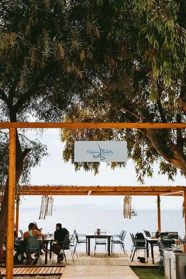 Seafront terrace of Thalatta Thalatta taverna on Plataria beach, a few metres from the water